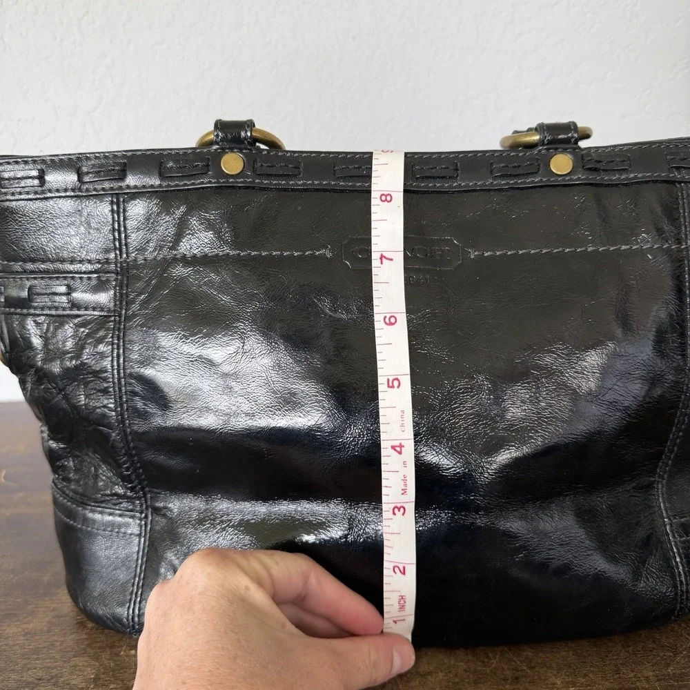Coach Gallery Laced East West tote bag in black patent Leather Brass Hardware.